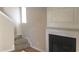 Living room featuring a decorative fireplace and adjacent staircase with wood flooring at 4949 Southgate Pkwy., Myrtle Beach, SC 29579