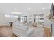 Well-lit living room offers a view to the dining area and large windows at 503 Rose Fountain Dr., Myrtle Beach, SC 29579