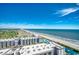 Expansive aerial view showcasing ocean, beach and neighboring lush landscape at 5905 S Kings Hwy. # 1717, Myrtle Beach, SC 29575