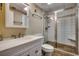 Bathroom with a single vanity, tile flooring, and a glass-enclosed shower with a built-in seat at 5905 S Kings Hwy. # 1717, Myrtle Beach, SC 29575