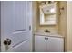 Bathroom with a white vanity, mirror, and a door with a knob at 5905 S Kings Hwy. # 1717, Myrtle Beach, SC 29575
