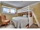 Bedroom with a bunk bed, a chair, and a window with blinds at 5905 S Kings Hwy. # 1717, Myrtle Beach, SC 29575