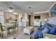 Open-concept living area with a kitchen, living room, a dining table, and a TV at 5905 S Kings Hwy. # 1717, Myrtle Beach, SC 29575