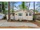 Charming single-story home featuring a cozy porch and well-maintained landscaping at 6001-1501 S Kings Hwy., Myrtle Beach, SC 29575