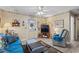 Comfortable living room featuring a cozy sofa, armchair, and nautical decor at 6001-1501 S Kings Hwy., Myrtle Beach, SC 29575
