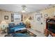 Inviting living room with a comfortable sofa, nautical decor, and lots of natural light at 6001-1501 S Kings Hwy., Myrtle Beach, SC 29575