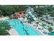 A vibrant aerial shot of a waterpark with pools, slides, and lounge areas surrounded by greenery at 6001-1501 S Kings Hwy., Myrtle Beach, SC 29575