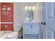 Bathroom with a vanity, sink, lighting and colorful tile accent at 601 Mitchell Dr. # 806, Myrtle Beach, SC 29577