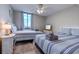 Bedroom with two double beds, side table, and flat screen TV at 601 Mitchell Dr. # 806, Myrtle Beach, SC 29577