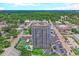 Exterior shot of the condominium building, highlighting balconies and surrounding neighborhood at 601 Mitchell Dr. # 806, Myrtle Beach, SC 29577