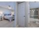 Interior view showing a bedroom and bathroom, highlighting the layout and flow of the space at 601 Mitchell Dr. # 806, Myrtle Beach, SC 29577