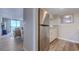 Condo kitchen featuring stainless steel refrigerator, microwave, and laminate floors at 601 Mitchell Dr. # 806, Myrtle Beach, SC 29577