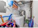 Functional laundry room with a washer, dryer, and storage shelves for convenience at 601 Mitchell Dr. # 806, Myrtle Beach, SC 29577