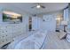 Bedroom with a TV, dresser and adjoining bathroom at 601 Mitchell Dr. # 806, Myrtle Beach, SC 29577