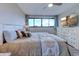 Bedroom with neutral colors, a TV, and picturesque beach views at 601 Mitchell Dr. # 806, Myrtle Beach, SC 29577