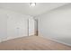 Bedroom with neutral carpet, double door closet and entry into the bathroom at 610 Lightwood Dr., Conway, SC 29526