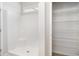 Clean bathroom featuring a shower and storage shelves at 618 Lightwood Dr., Conway, SC 29526