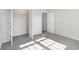 Cozy bedroom featuring carpet, closet with shelving, and white walls throughout at 618 Lightwood Dr., Conway, SC 29526