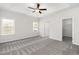 Spacious bedroom with large windows and ceiling fan at 618 Lightwood Dr., Conway, SC 29526