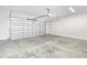 Spacious two-car garage with concrete flooring, and an automatic door at 618 Lightwood Dr., Conway, SC 29526