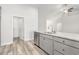 Bright kitchen featuring granite countertops, stainless steel appliances, and gray cabinets at 618 Lightwood Dr., Conway, SC 29526