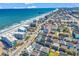 Beautiful aerial view of the beach houses and apartments along the coastline at 720 N Waccamaw Dr. # 202, Garden City Beach, SC 29576
