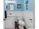A well-maintained bathroom featuring clean fixtures and a neat arrangement at 720 N Waccamaw Dr. # 202, Garden City Beach, SC 29576