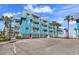 Exterior view of the updated buildings with parking at 720 N Waccamaw Dr. # 202, Garden City Beach, SC 29576