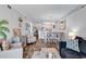 Spacious living area with an open layout, connecting seamlessly to the kitchen and dining spaces for easy entertaining at 720 N Waccamaw Dr. # 202, Garden City Beach, SC 29576