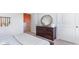 Bedroom featuring a rustic dresser, closet, and nautical decor at 738 Chazen Way, Longs, SC 29568