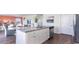 Kitchen island with granite countertops, stainless steel dishwasher, and seating with a combined dining area at 738 Chazen Way, Longs, SC 29568