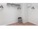 Functional walk-in closet with wire shelving, space for storage baskets, and a modern gray striped hamper at 738 Chazen Way, Longs, SC 29568