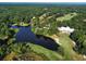 Breathtaking aerial view showcasing the golf course and surrounding trees at 75-4 Weehawka Way # 4, Pawleys Island, SC 29585