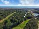Stunning aerial view of property surrounded by golf course and close to the ocean at 75-4 Weehawka Way # 4, Pawleys Island, SC 29585