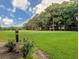 Scenic view of lush green golf course lined with trees and well maintained grass at 75-4 Weehawka Way # 4, Pawleys Island, SC 29585