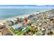 Aerial view of neighborhood homes near the beach with views of the ocean and city landscape at 807 N Waccamaw Dr., Murrells Inlet, SC 29576