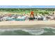 Beachside aerial view highlighting property's proximity to ocean, beach, and nearby buildings at 807 N Waccamaw Dr., Murrells Inlet, SC 29576