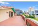 Wide balcony with decorative railings provides a view of the street and nearby buildings at 807 N Waccamaw Dr., Murrells Inlet, SC 29576