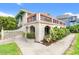 Lovely mediterranean-style home with red tile roof, mature plantings, and brick exterior at 807 N Waccamaw Dr., Murrells Inlet, SC 29576