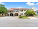 Beautiful mediterranean-style home with ample parking and well-maintained landscaping at 807 N Waccamaw Dr., Murrells Inlet, SC 29576