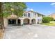 Mediterranean-style home featuring unique architectural design and spacious driveway at 807 N Waccamaw Dr., Murrells Inlet, SC 29576
