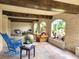 Inviting outdoor living space with brick arches, comfortable seating, and natural light at 807 N Waccamaw Dr., Murrells Inlet, SC 29576