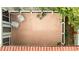 Top-down view of a private terrace with outdoor chairs and potted plants at 807 N Waccamaw Dr., Murrells Inlet, SC 29576