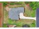 Aerial view of the home with landscaped yard, and paved driveway at 8207 Timber Ridge Rd., Conway, SC 29526