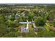Aerial view of the property featuring mature trees, lake and neighborhood at 8207 Timber Ridge Rd., Conway, SC 29526