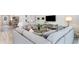Cozy living room with plush seating, sleek flooring, and stylish decor, perfect for relaxation and entertainment at 846 Ireland Dr., Longs, SC 29568