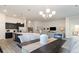 Open-concept living space combining the kitchen, dining, and living areas for easy entertaining at 846 Ireland Dr., Longs, SC 29568