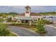 Restaurant view showcasing well-manicured landscaping and a charming entrance near the waterway at 9485 Ronda Ct., Myrtle Beach, SC 29579