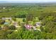 This aerial view shows the home's location amidst lush greenery and nearby houses at 96 Middleton Rd., Andrews, SC 29510