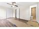 Bedroom with new flooring, neutral paint, and an ensuite bathroom at 96 Middleton Rd., Andrews, SC 29510